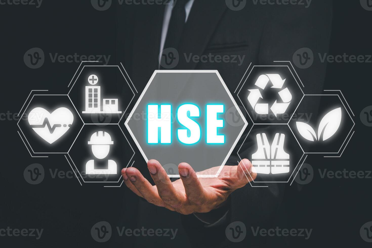 Health safety environment, HSE education industry Concept, Man hand holding health safety environment icon on virtual screen. photo