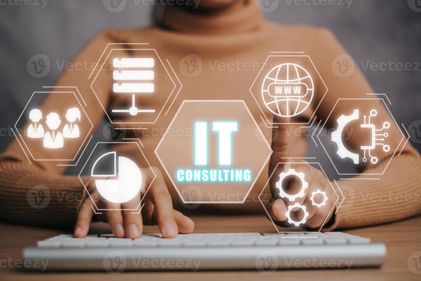 Consulting business concept, Person hand using keyboard computer with IT Consulting icon on virtual screen, robotic process automation, marketing dashboard. photo