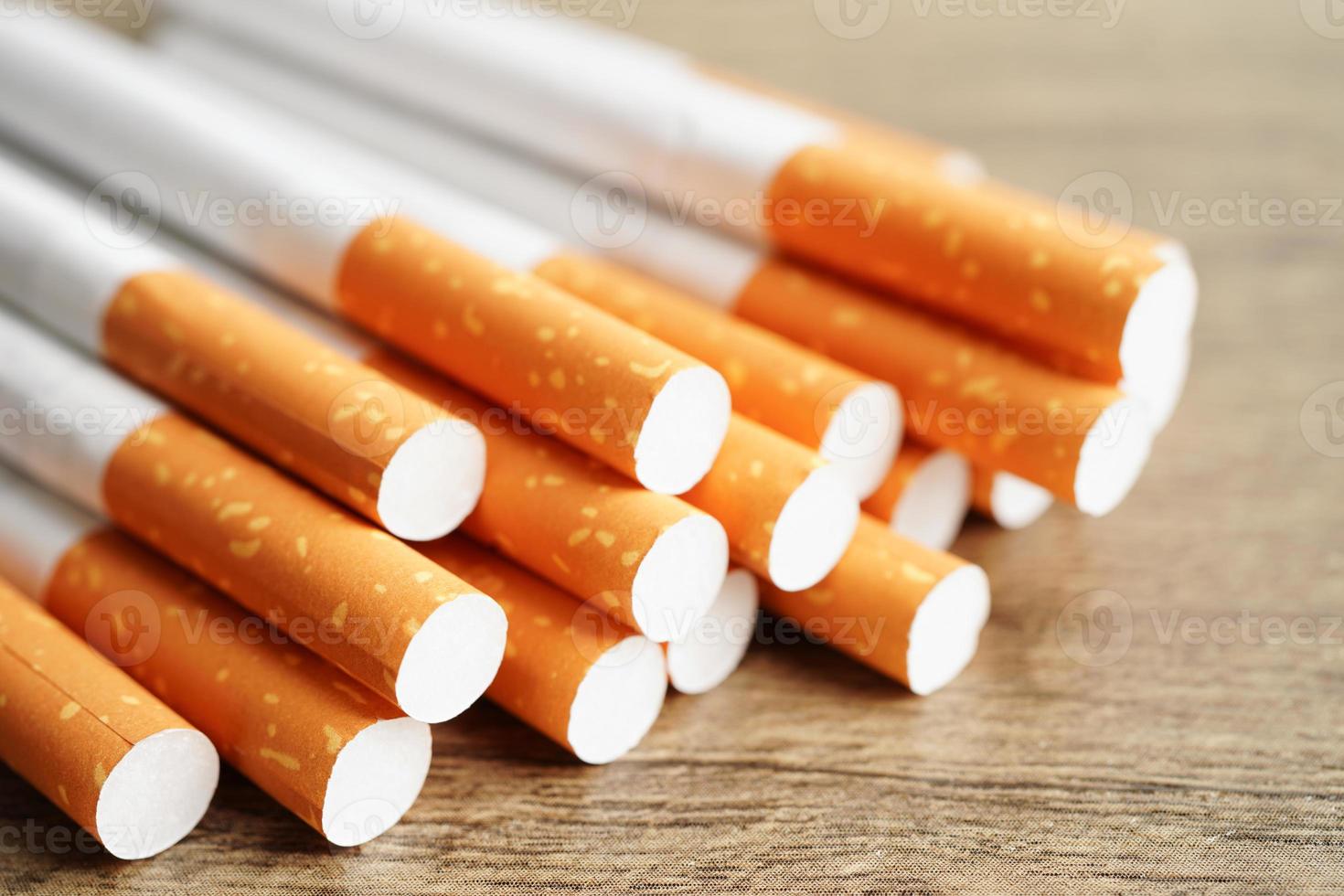 Cigarette, roll tobacco in paper with filter tube, No smoking concept. photo