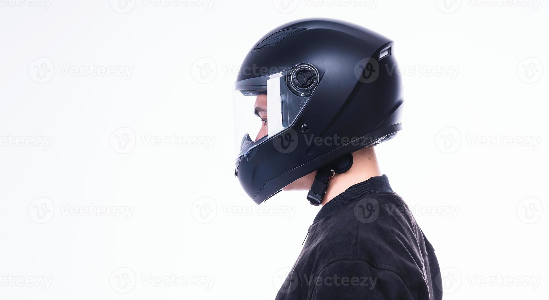 Image of young Asian man with helmet on background photo