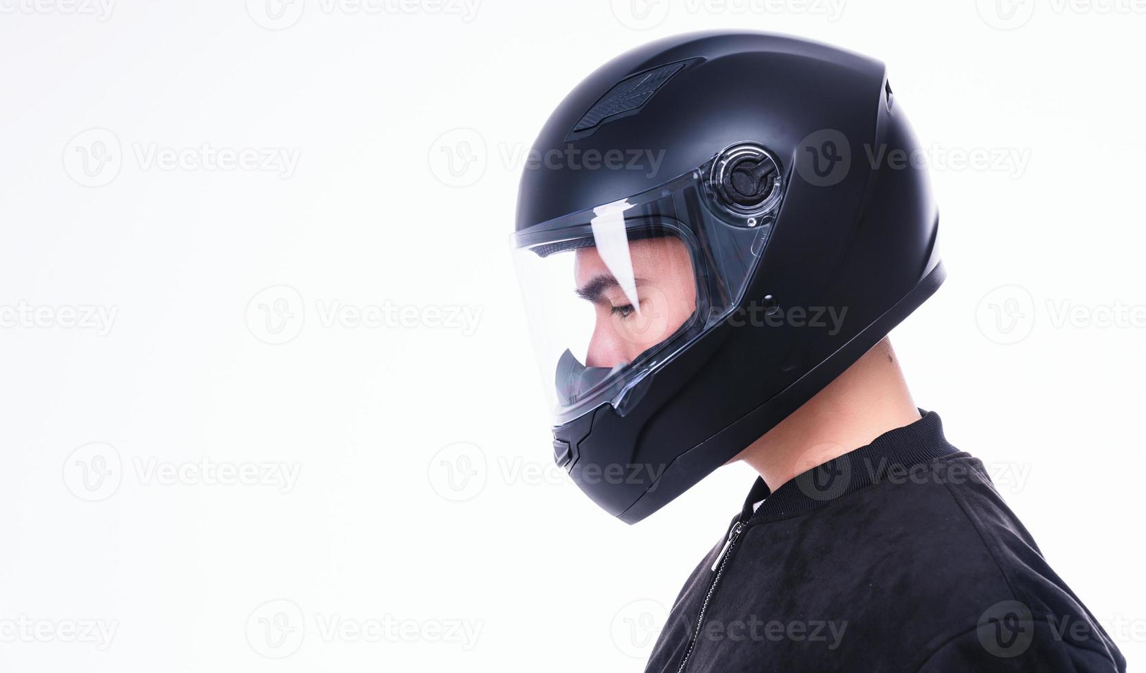 Image of young Asian man with helmet on background photo