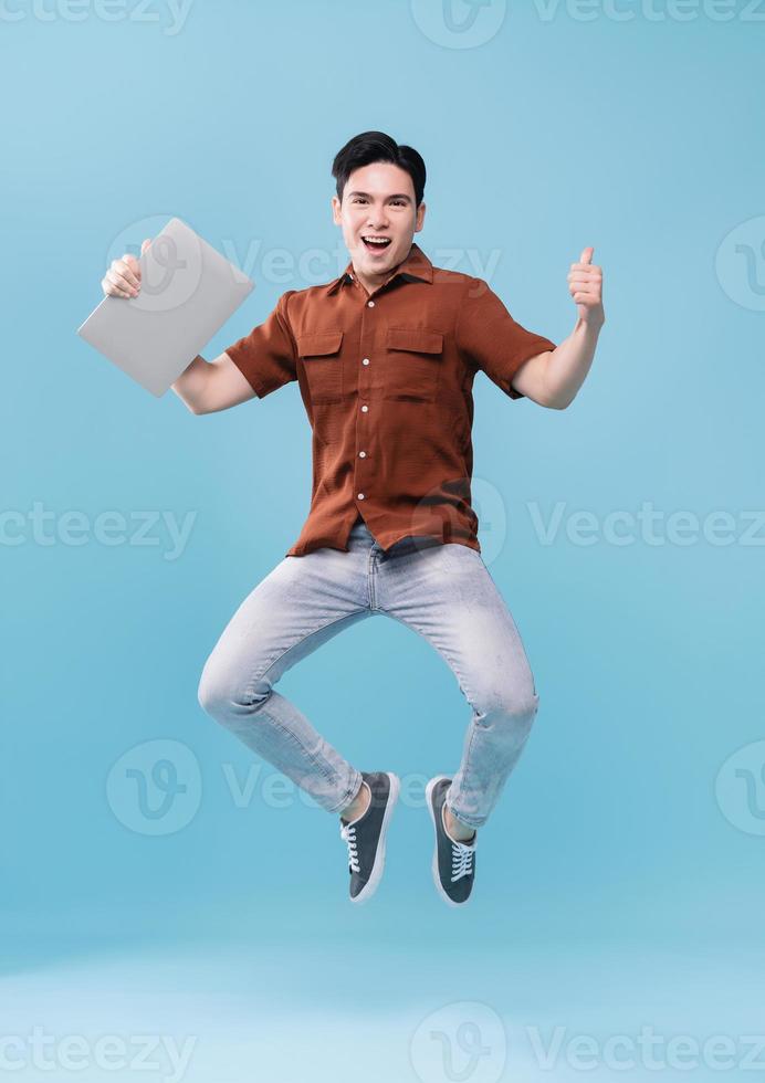 Image of young Asian man on background photo