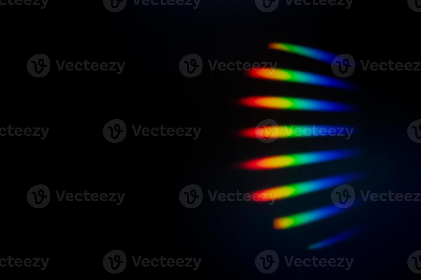 Prism Rainbow Specs on black Background Overlay photo