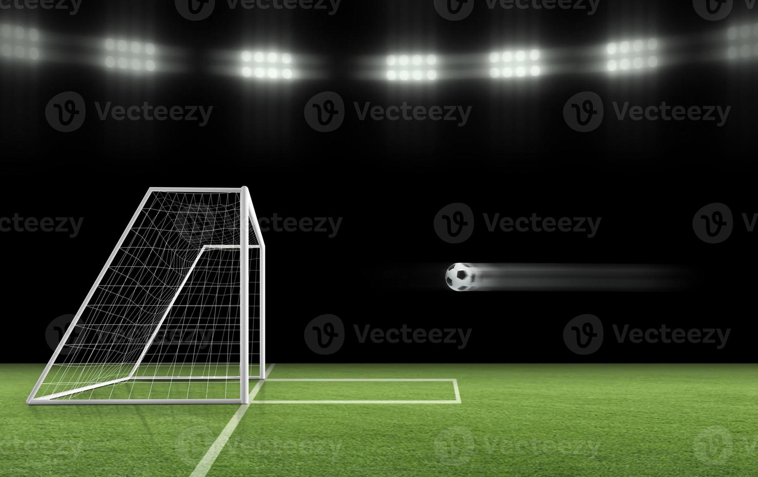 The soccer ball is flying into the goal on the soccer field. ball game concept photo