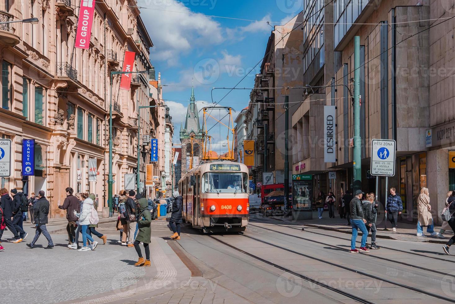 Classical tram going through the center of the Prague photo