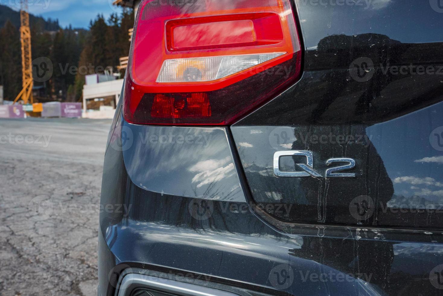 Closeup of car parked on road during trip photo