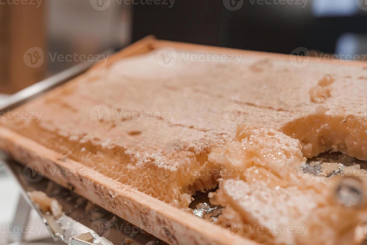 Closeup of honeycomb on counter in hotel photo