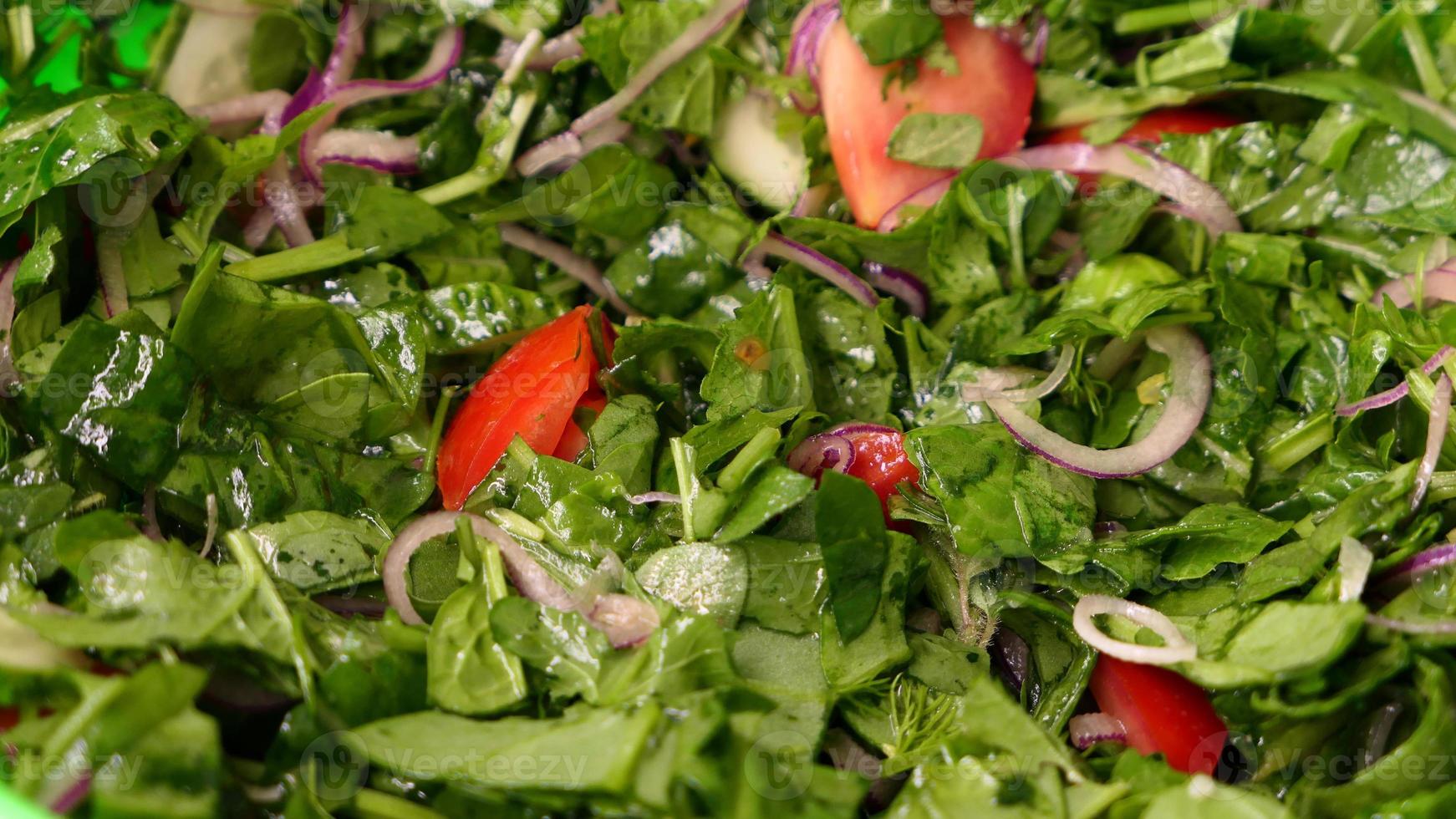 Salad with lettuce and a variety of fresh vegetables photo