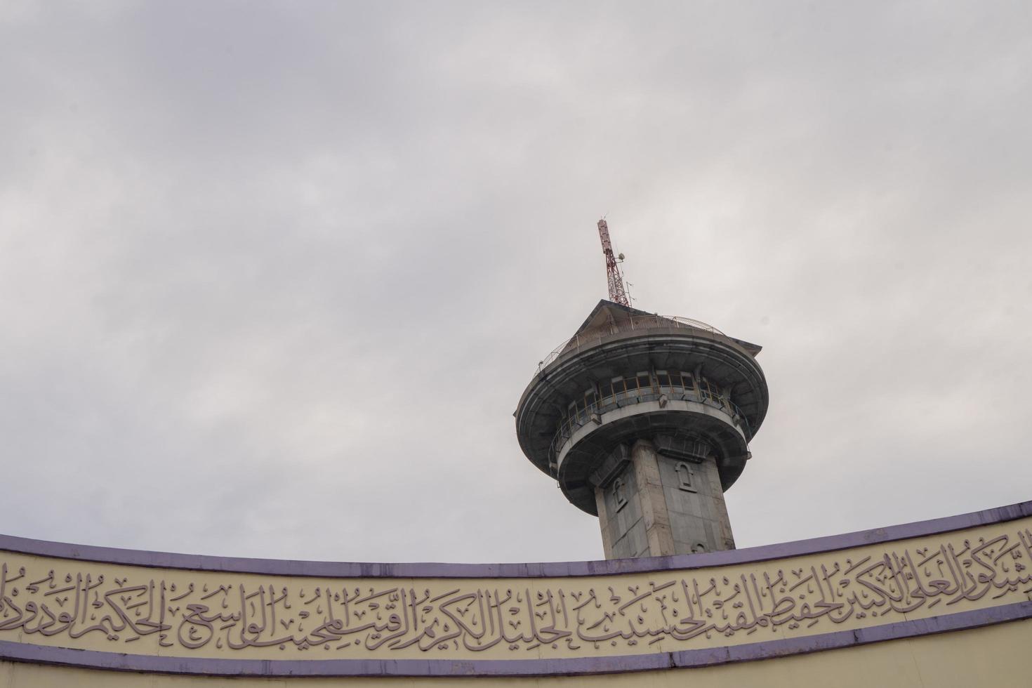 Main tower on Great agung mosque on the Semarang Central Java, when day time and blue sky. The photo is suitable to use for Ramadhan poster and Muslim content media.