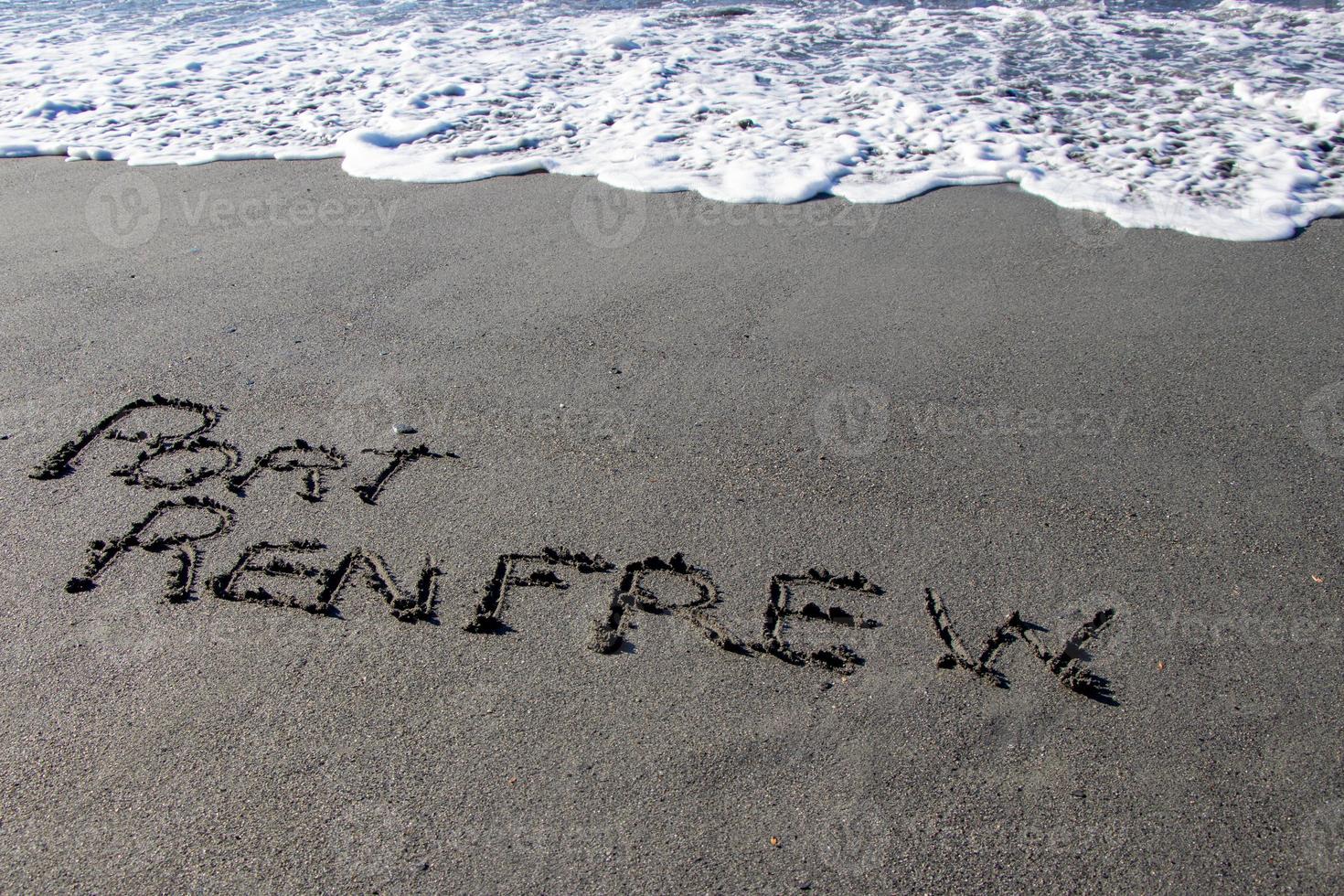 Port Renfrew written in the sand at the beach photo