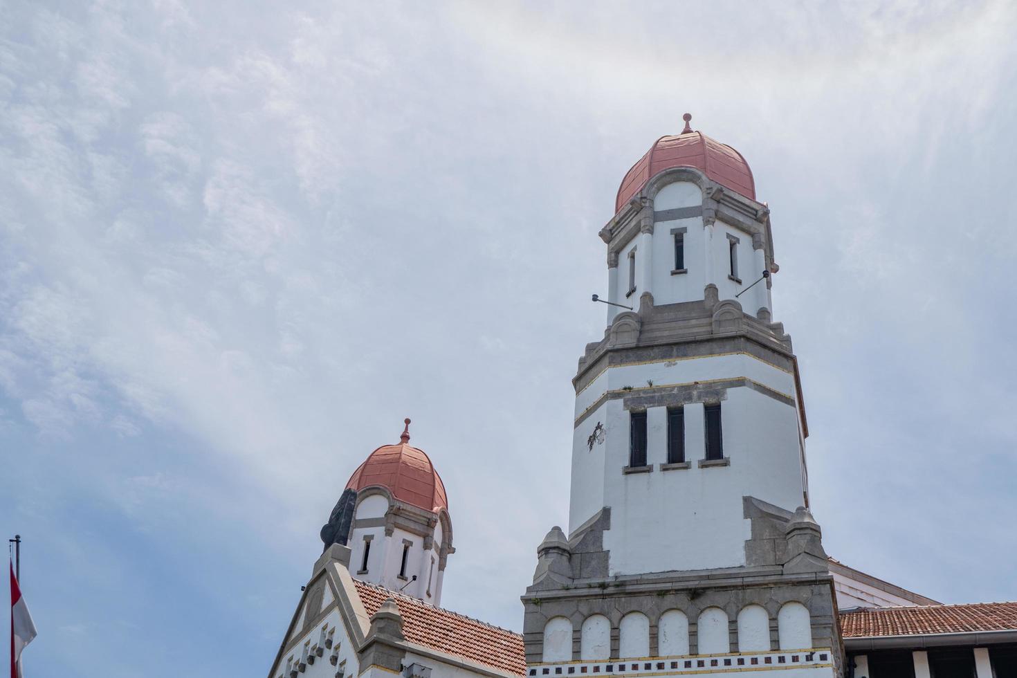 Tower on old mansion of Semarang Central Java with blue sky. The photo is suitable to use for travel destination, holiday poster and travel content media.