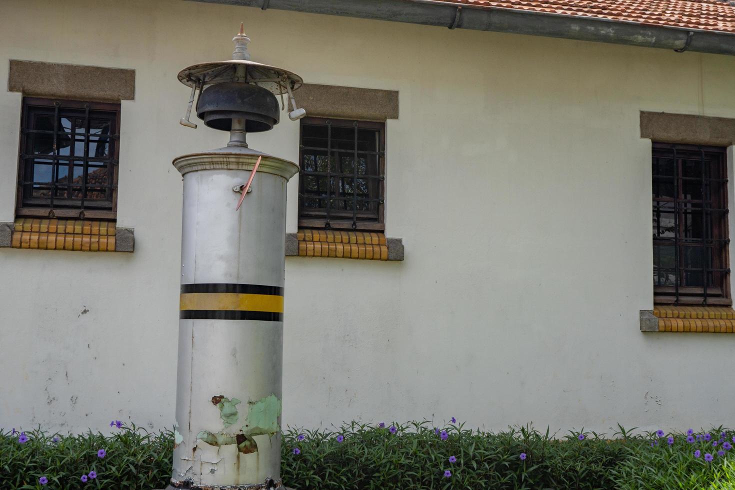 Old bell steam alarm for railway station. The photo is suitable to use for travel destination, holiday poster and travel content media.