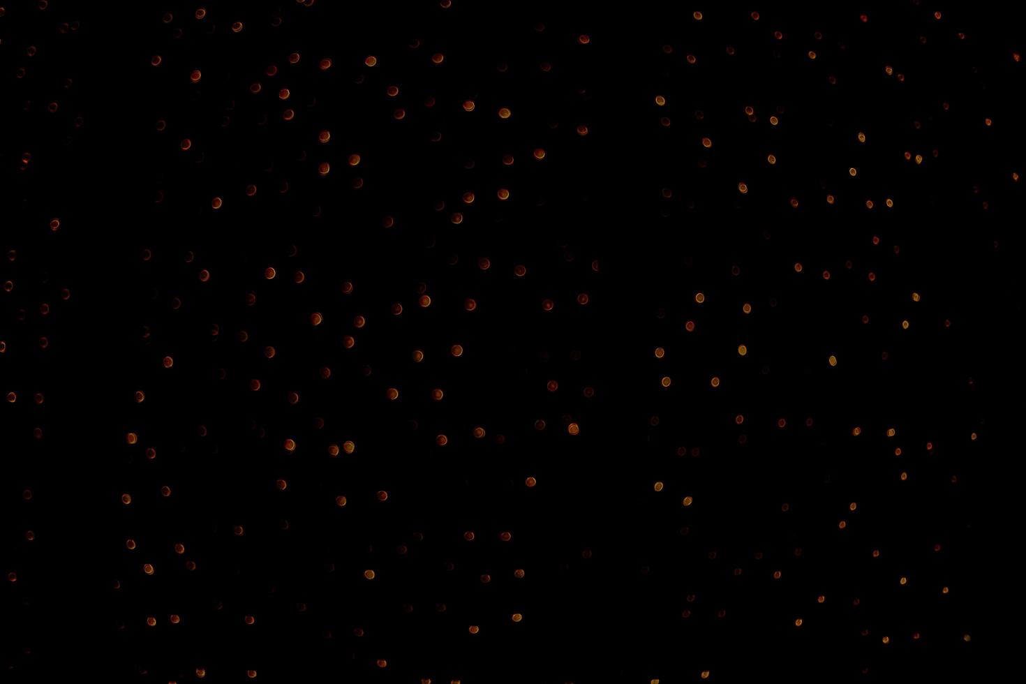 abstract bokeh background of golden light burst made from bokeh motion. photo