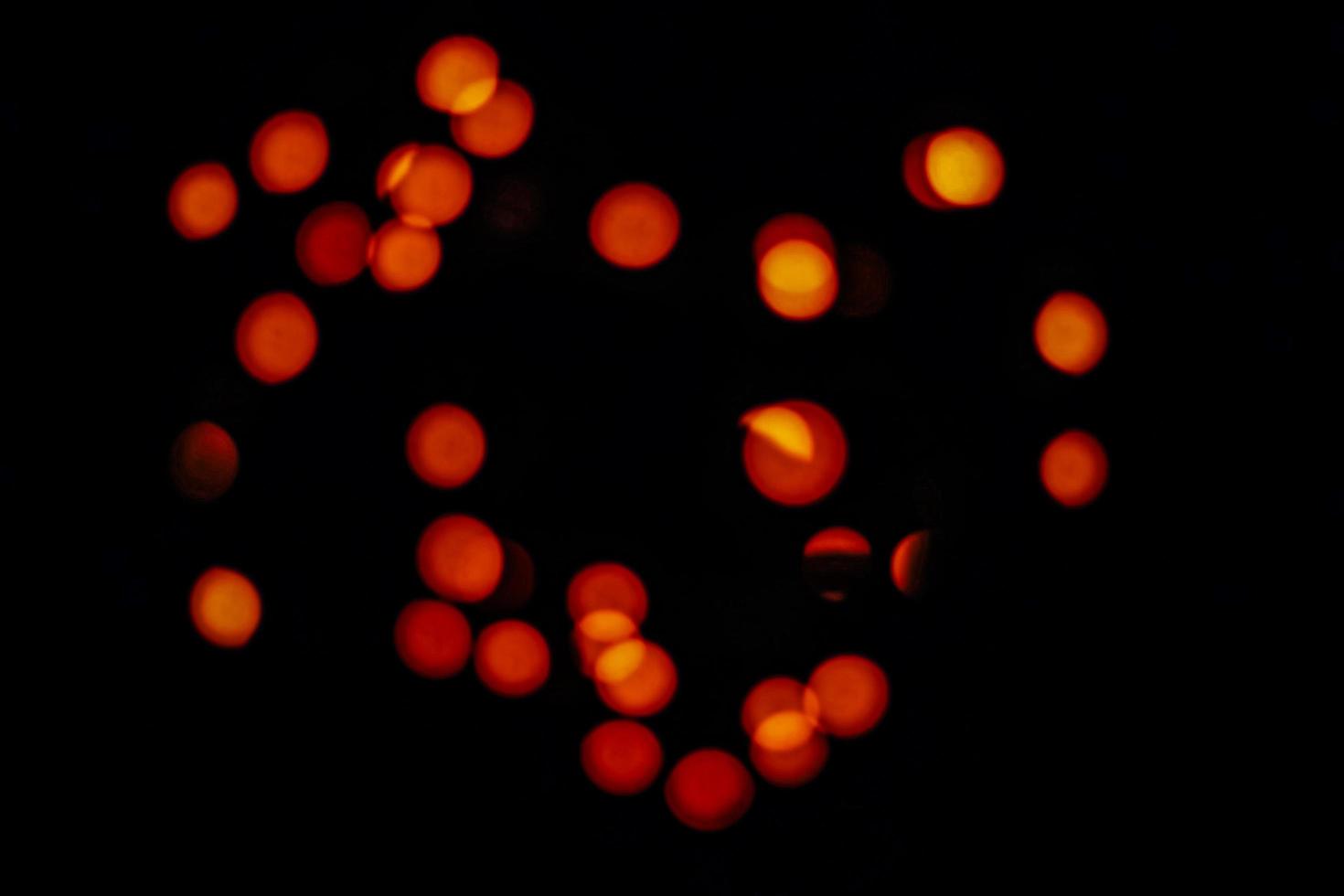 abstract bokeh background of golden light burst made from bokeh motion. photo