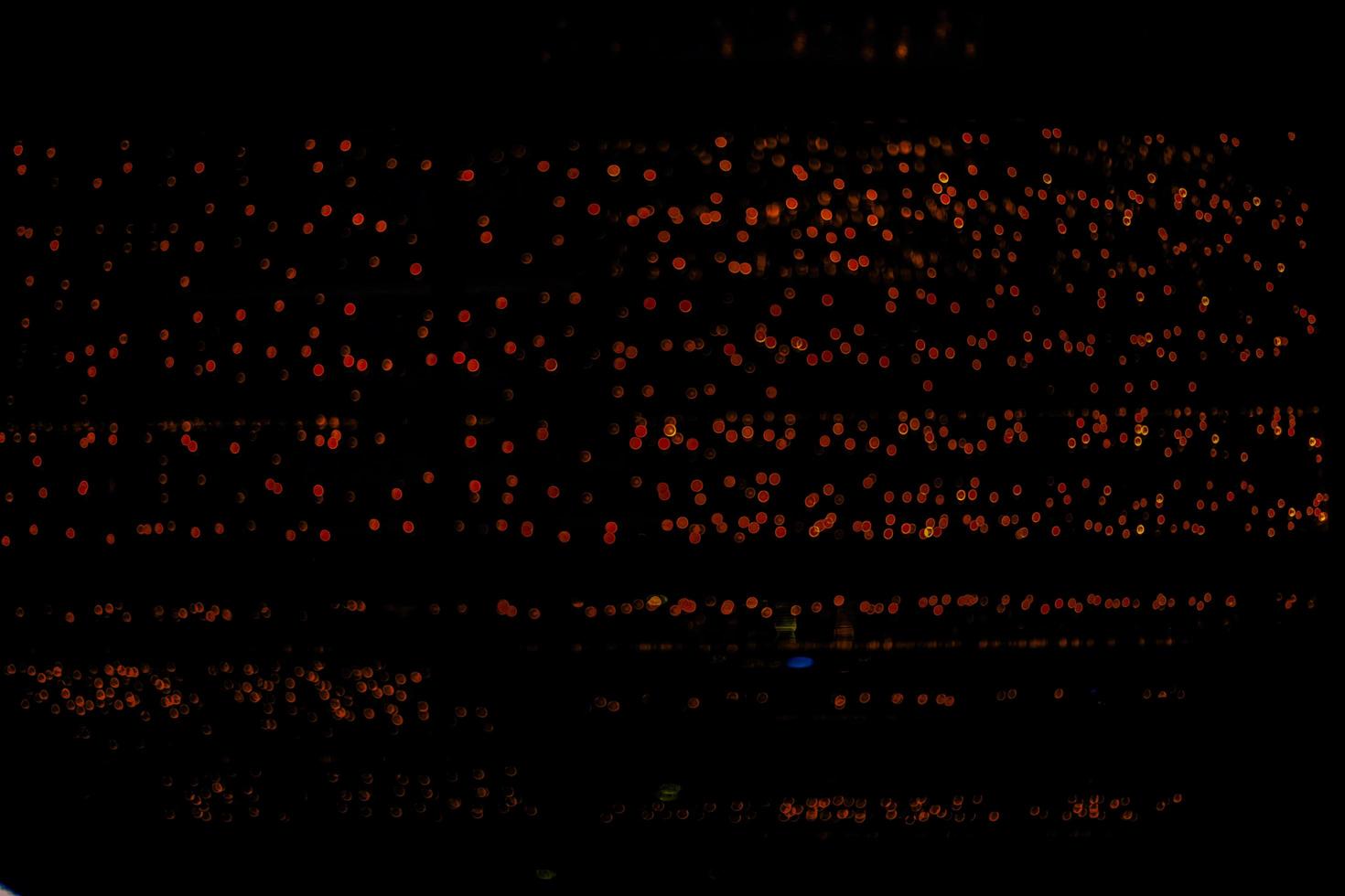 abstract bokeh background of golden light burst made from bokeh motion. photo