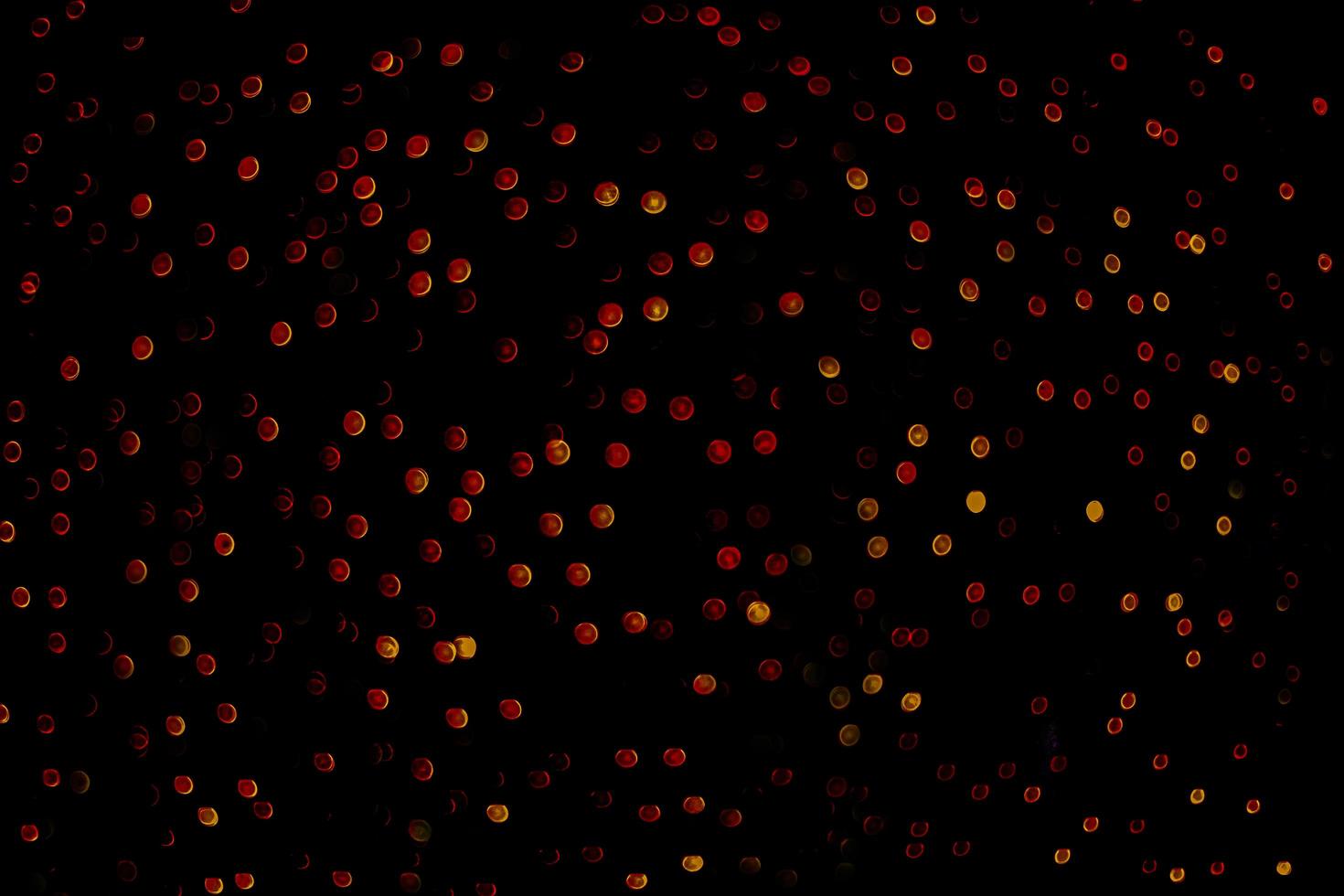 abstract bokeh background of golden light burst made from bokeh motion. photo