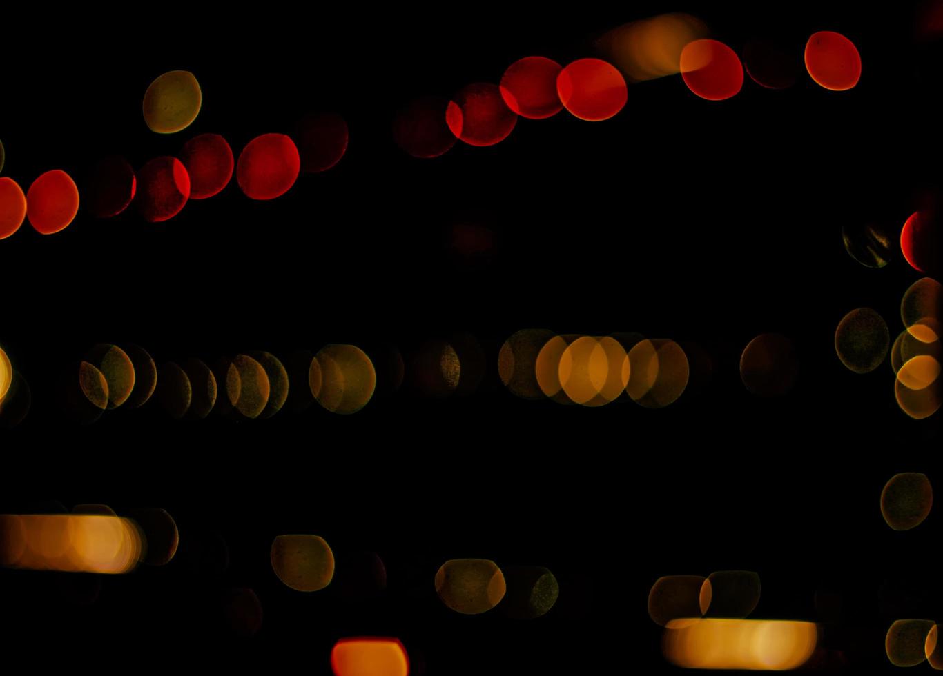 abstract bokeh background of golden light burst made from bokeh motion. photo