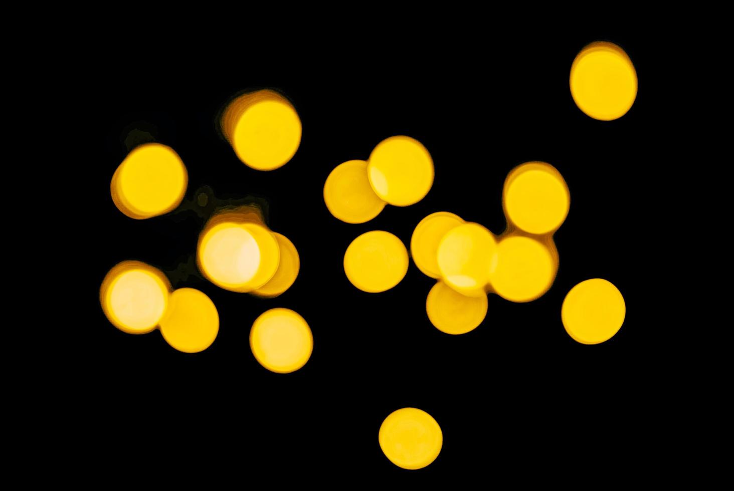 abstract bokeh background of golden light burst made from bokeh motion. photo