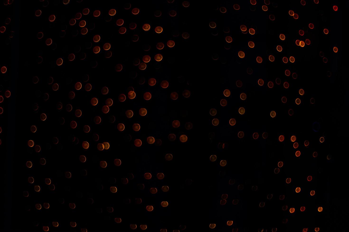 abstract bokeh background of golden light burst made from bokeh motion. photo