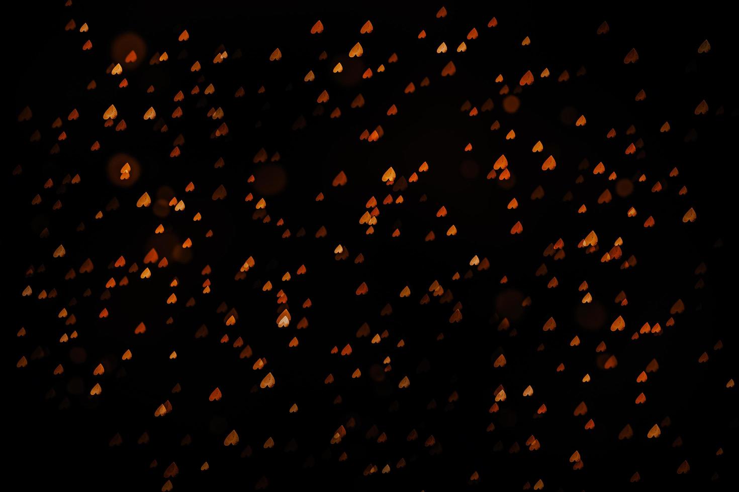 abstract bokeh background of golden light burst made from bokeh motion. photo