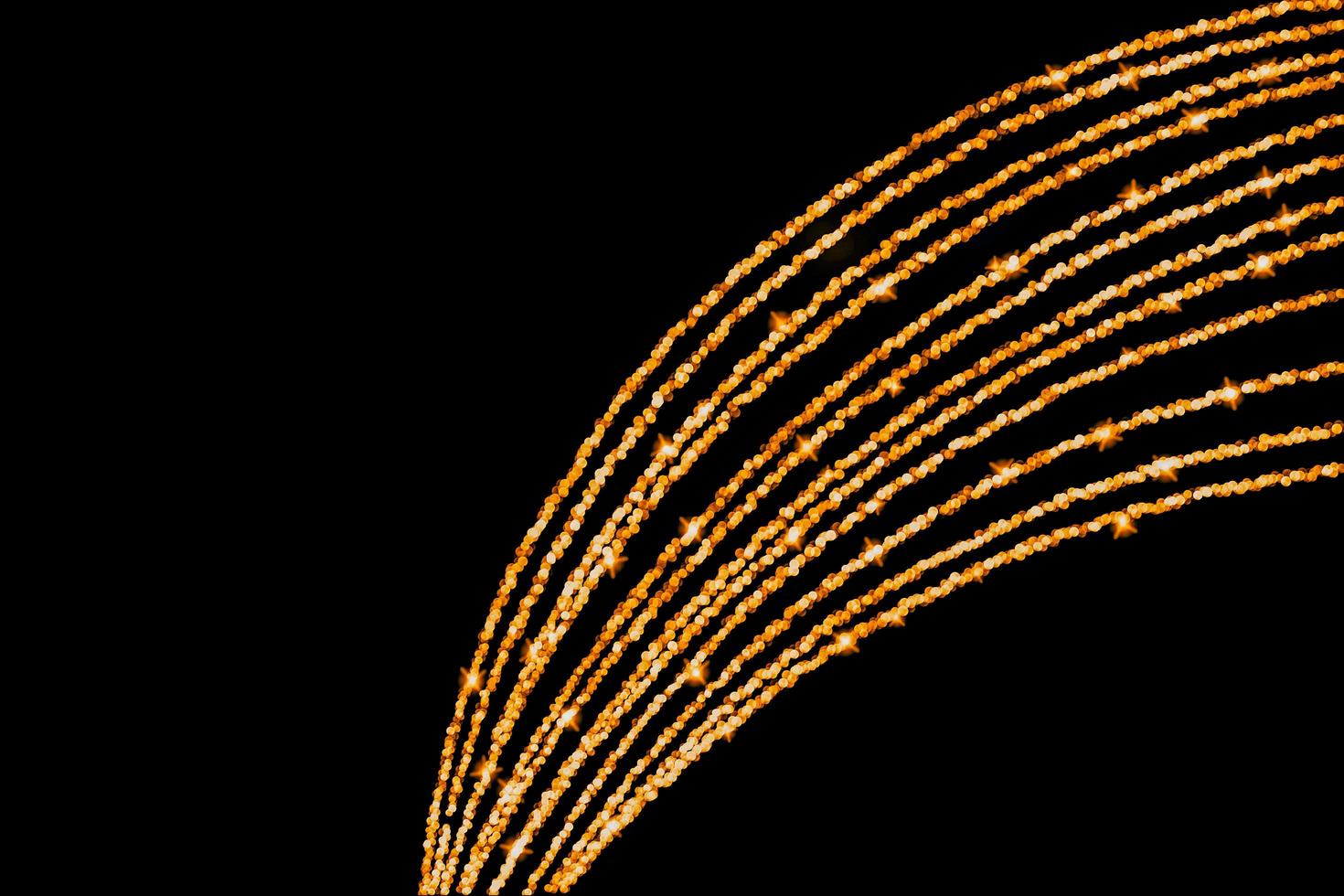 abstract bokeh background of golden light burst made from bokeh motion. photo