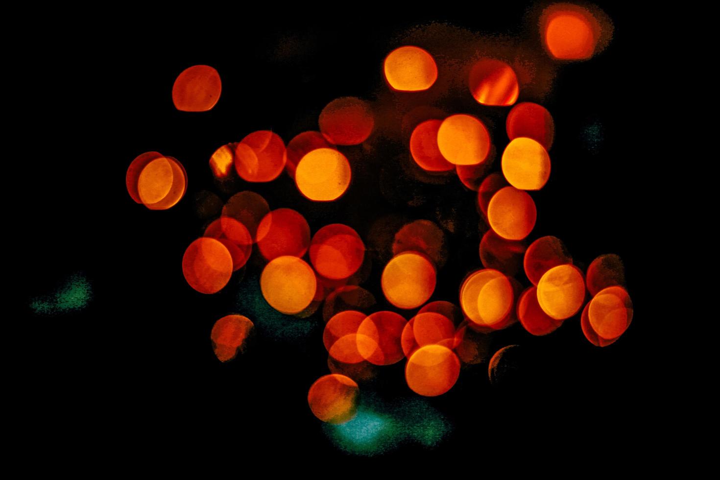 abstract bokeh background of golden light burst made from bokeh motion. photo