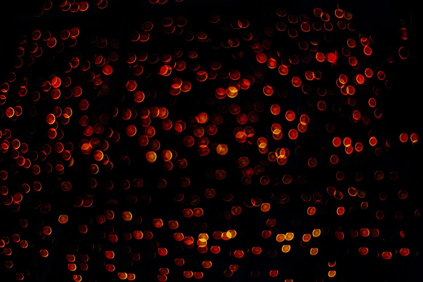 abstract bokeh background of golden light burst made from bokeh motion. photo