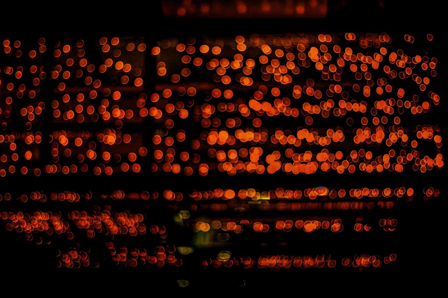 abstract bokeh background of golden light burst made from bokeh motion. photo