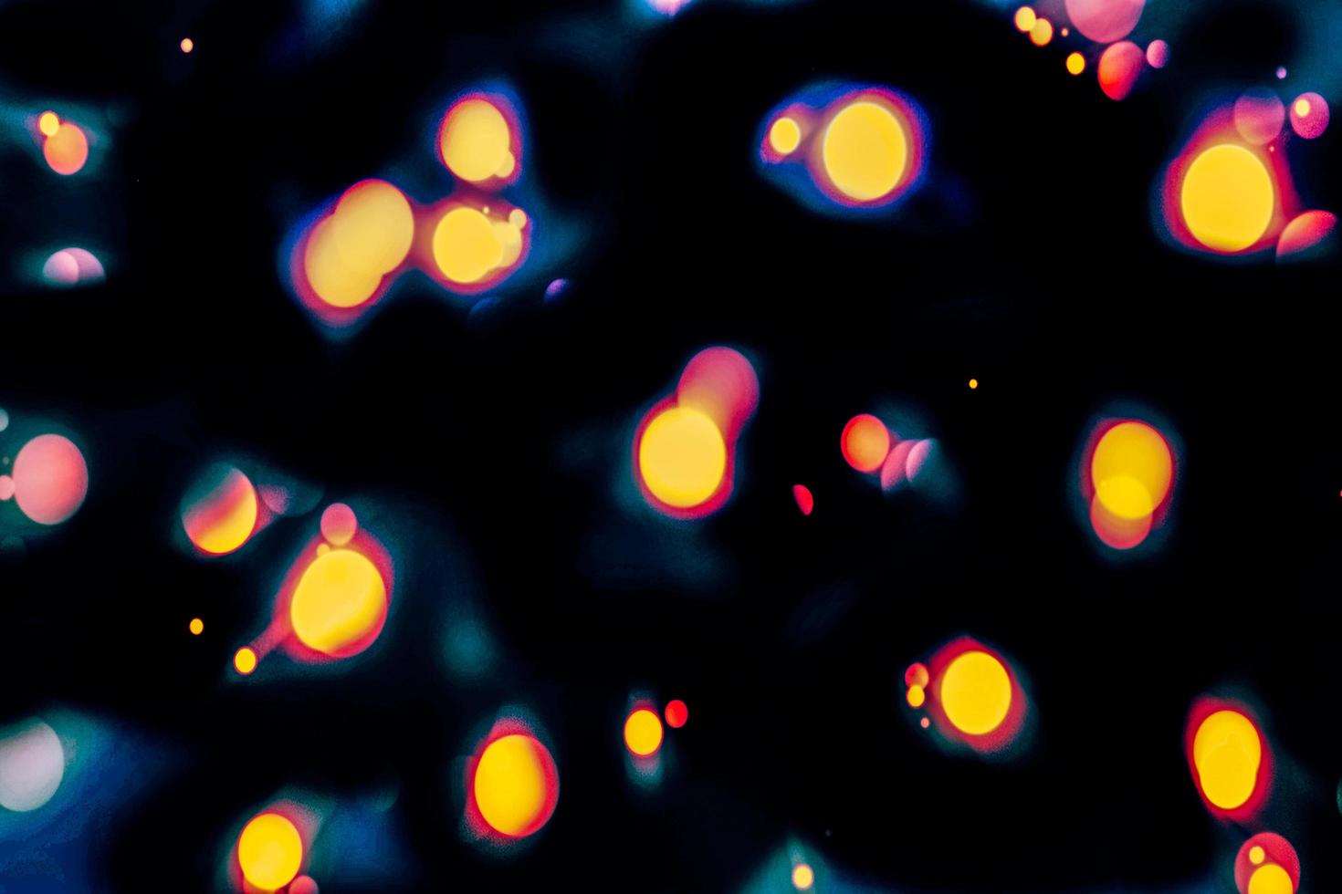 abstract bokeh background of golden light burst made from bokeh motion. photo