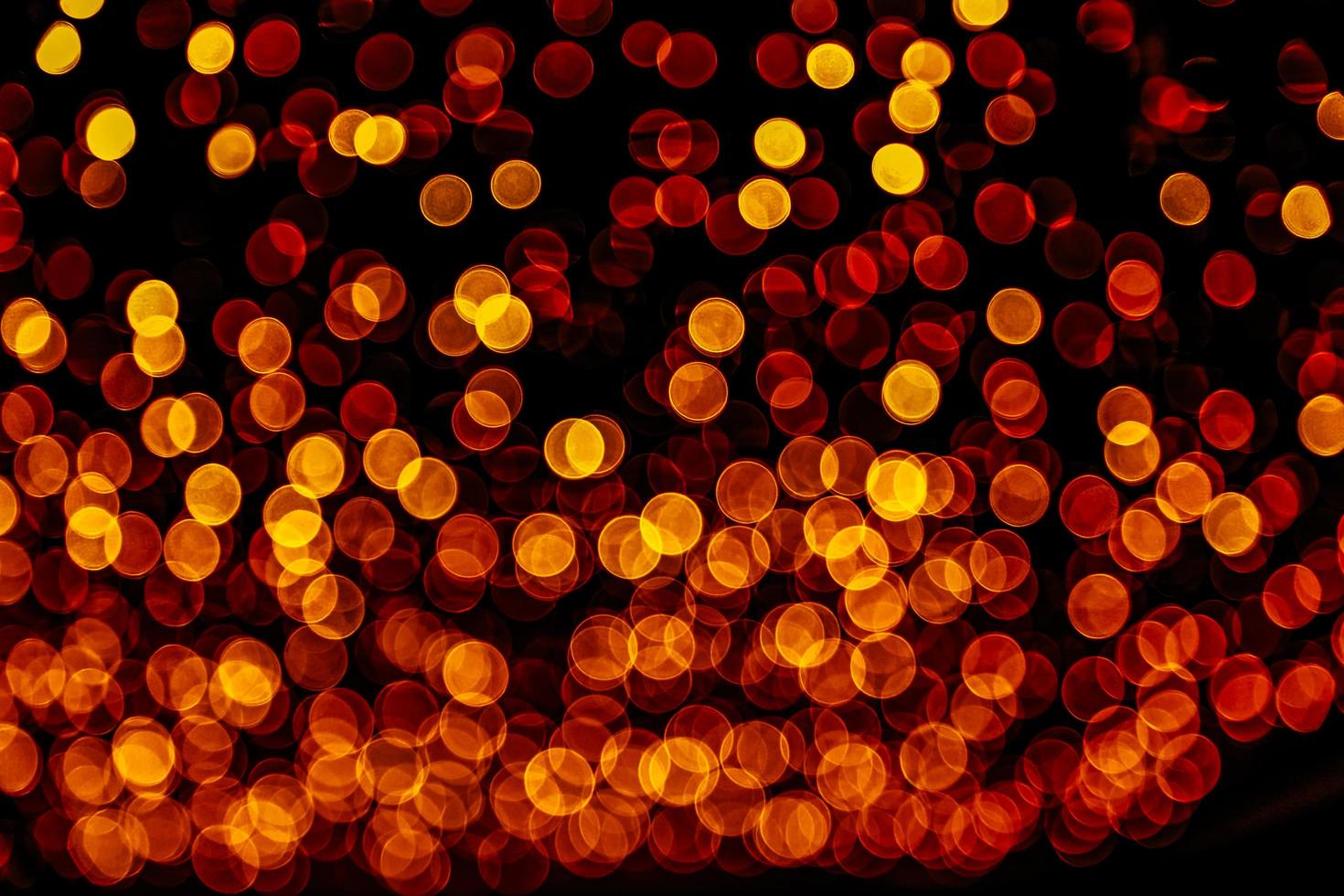 abstract bokeh background of golden light burst made from bokeh motion. photo