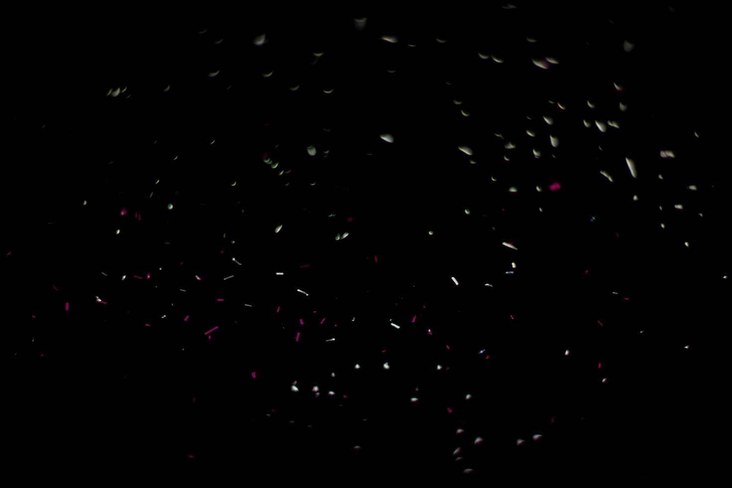 background of abstract glitter lights. gold and black. de focused photo