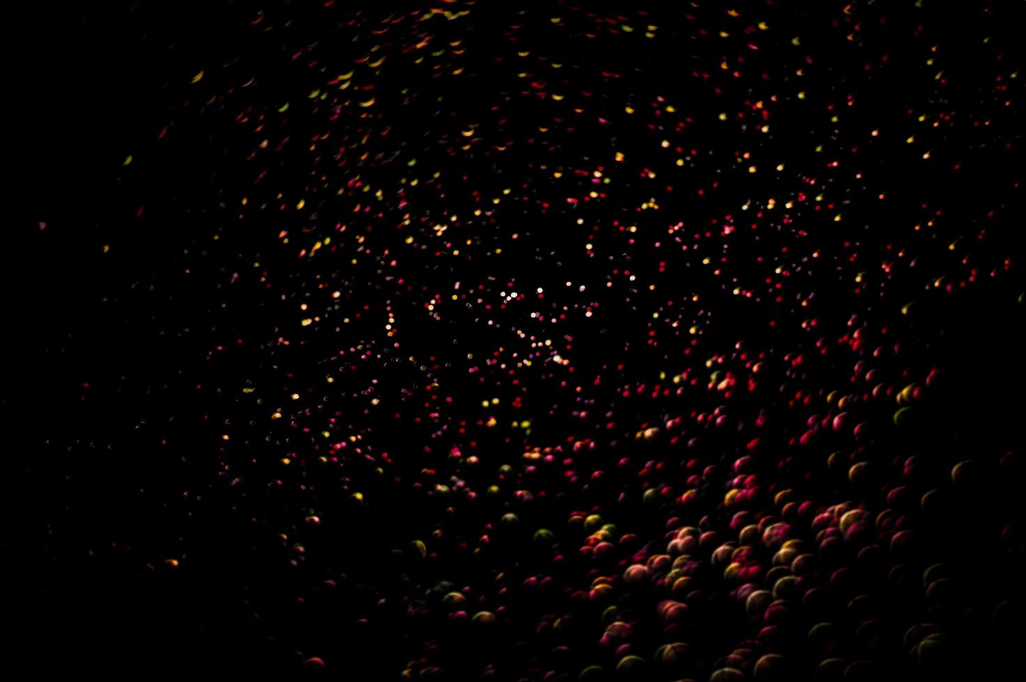 background of abstract glitter lights. gold and black. de focused photo