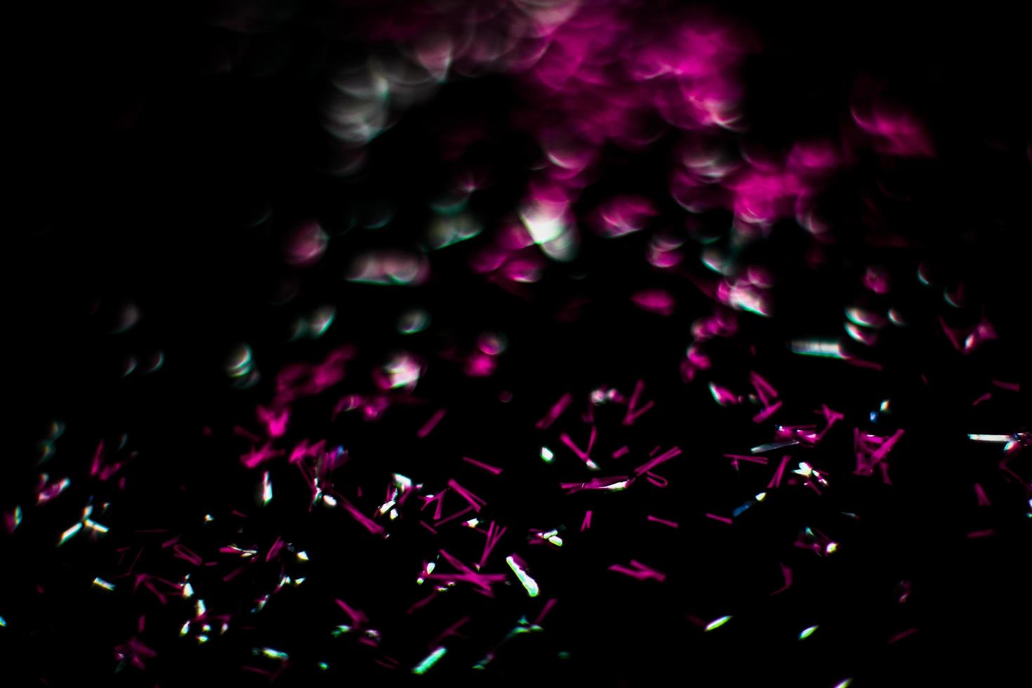 background of abstract glitter lights. gold and black. de focused photo