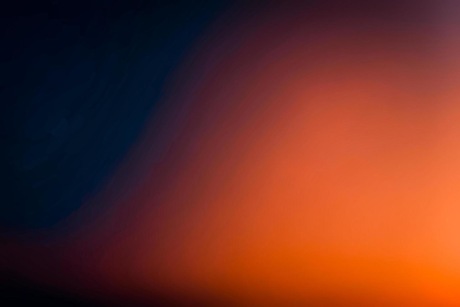 Lens flare and light leak haze texture on a black background. photo