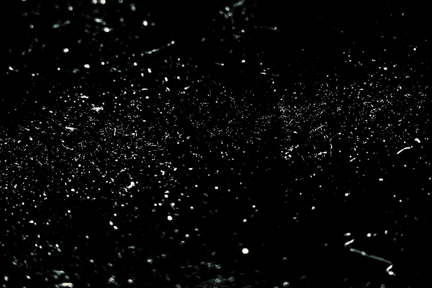 Dust sand cloud on a dusty road from a car. Scattering trail on track from fast movement photo