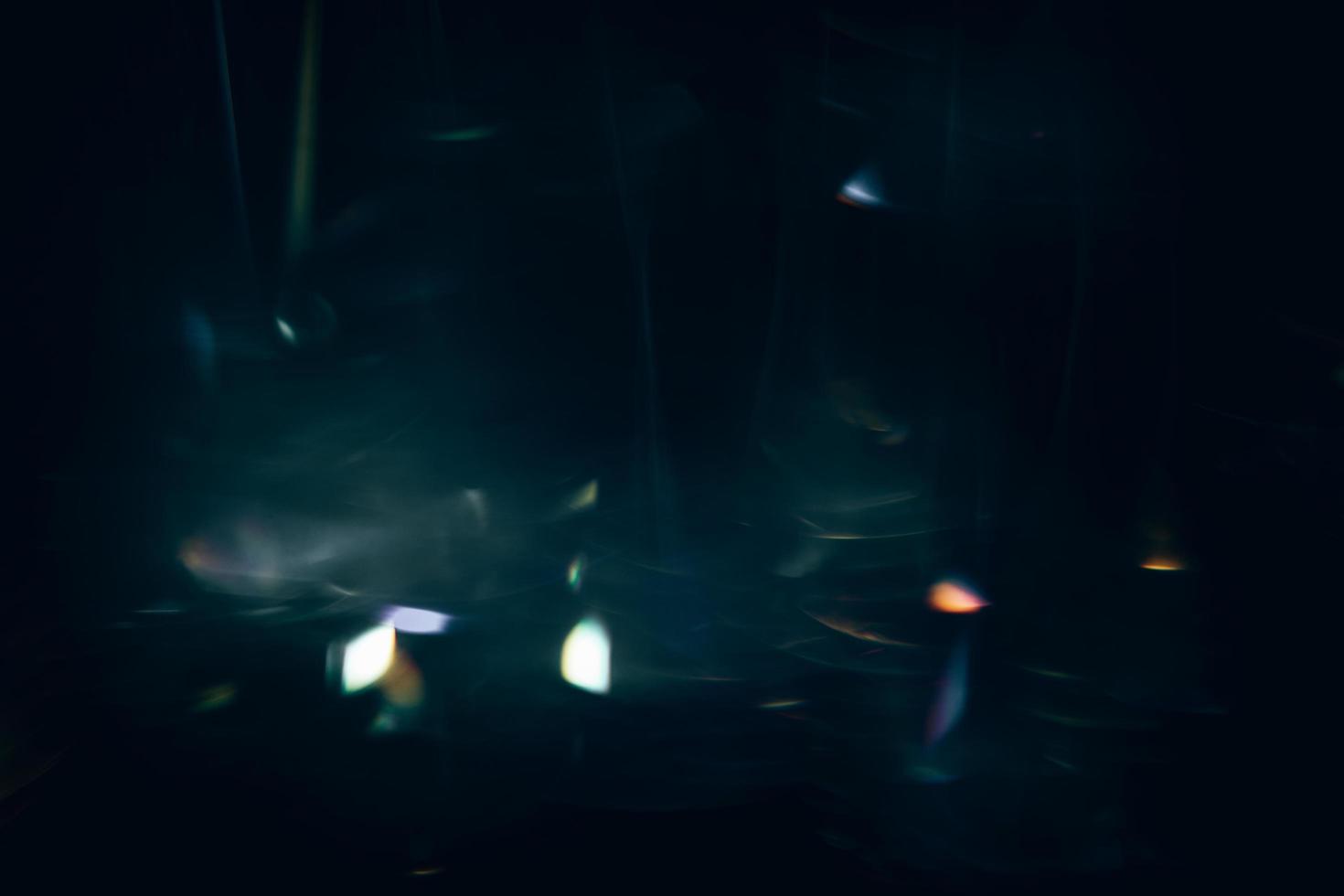 Scratched background. Lens flare effect. Blue distressed aged faded grunge surface with smeared stains dust noise colorful light design. photo