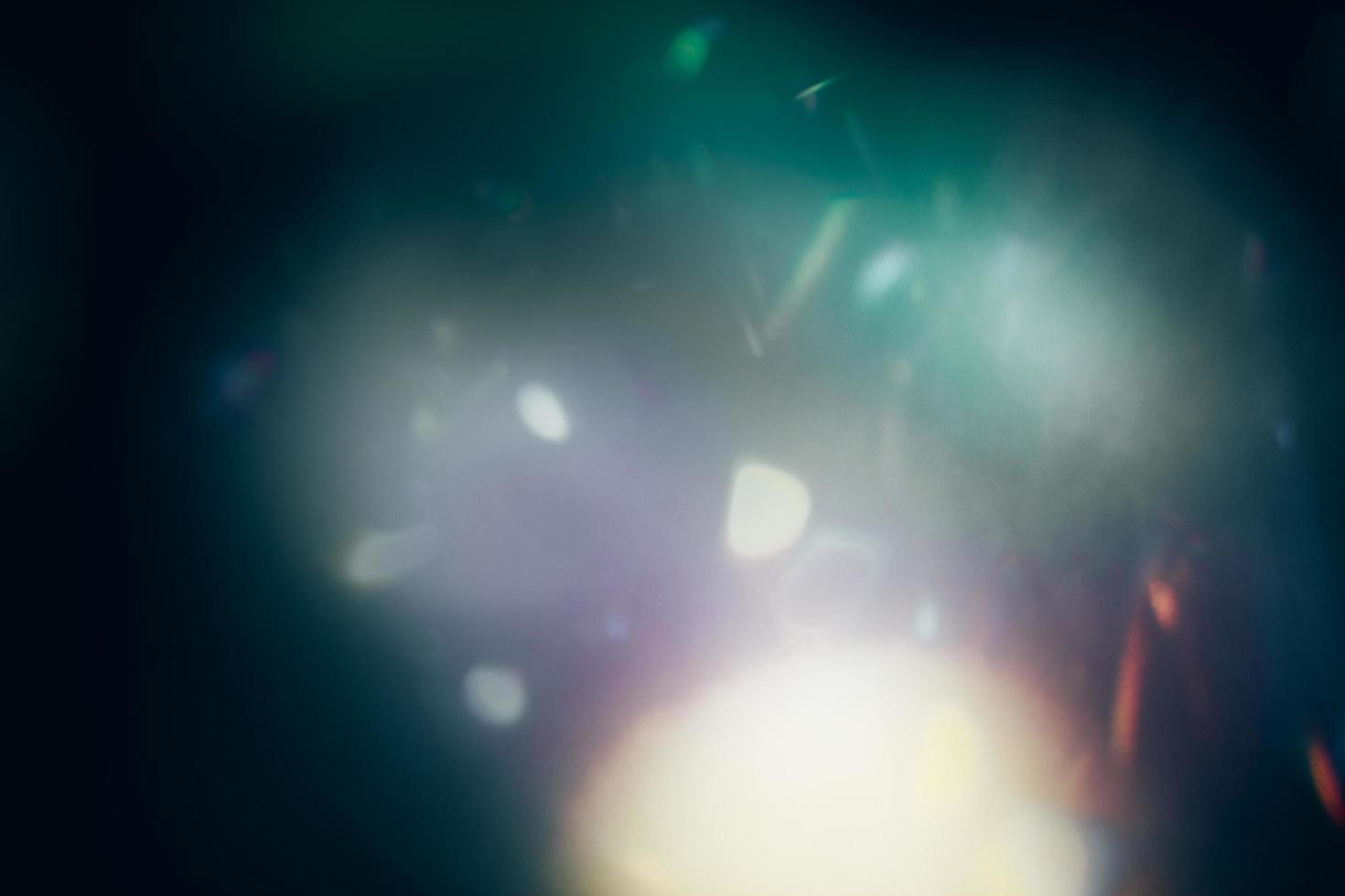 Scratched background. Lens flare effect. Blue distressed aged faded grunge surface with smeared stains dust noise colorful light design. photo