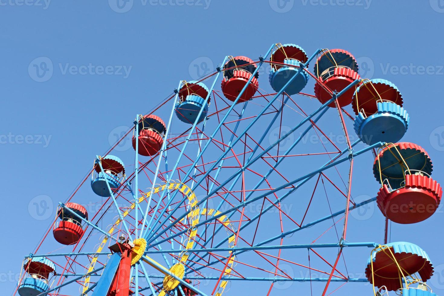 big wheel over blue sky photo