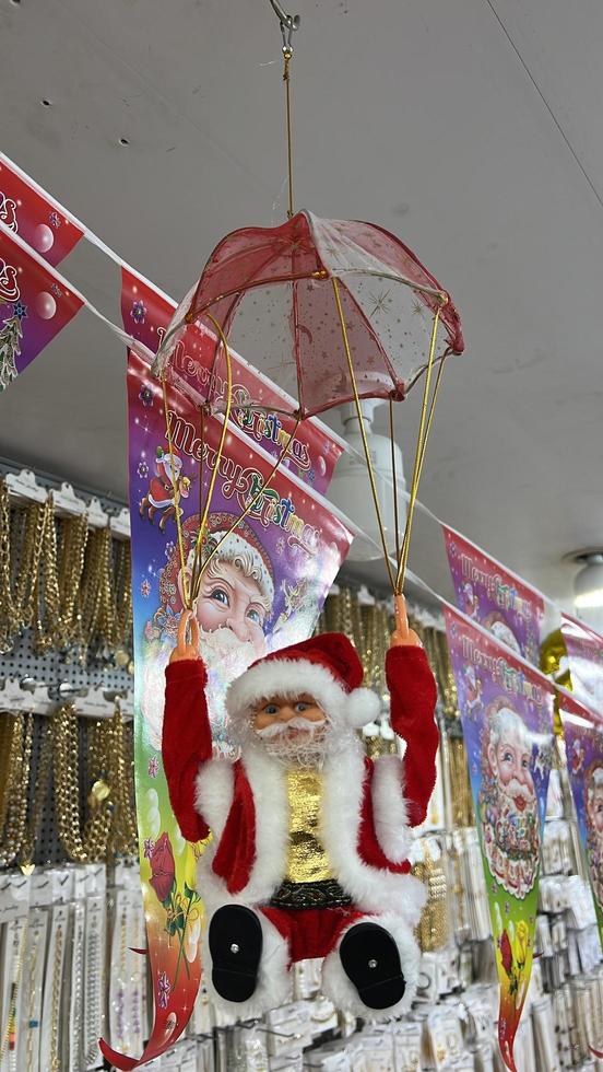 Christmas decoration on the shelf in a shop in the city of Baku photo