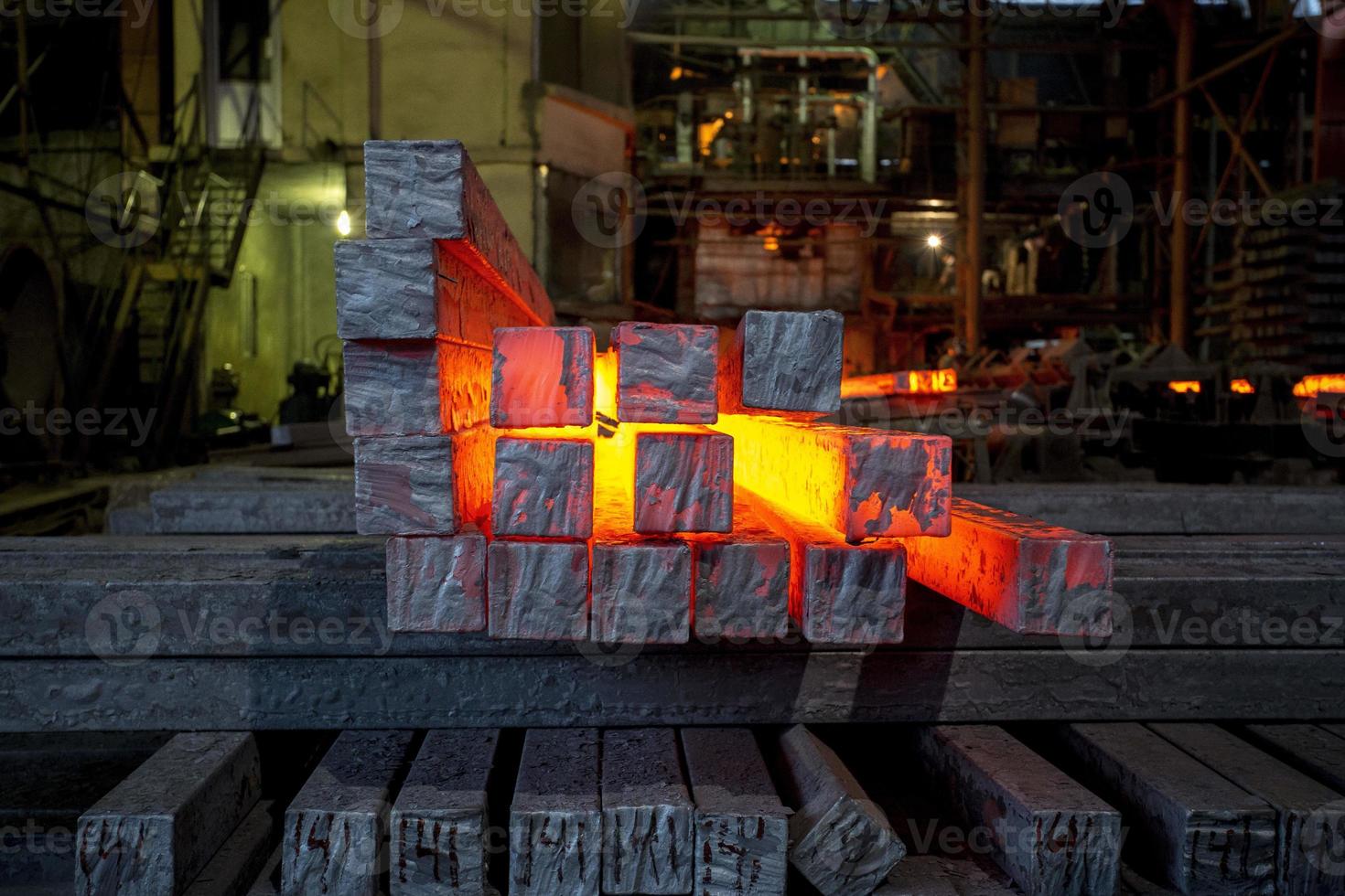 Heated metal pig gets squeezed and drilled at special metal forging unit at Brueck metal forging factory in Demra, Dhaka, Bangladesh. photo
