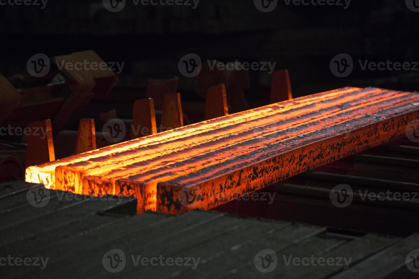 Steel slab being rolled on the Hot strip mill at Demra, Dhaka, Bangladesh photo