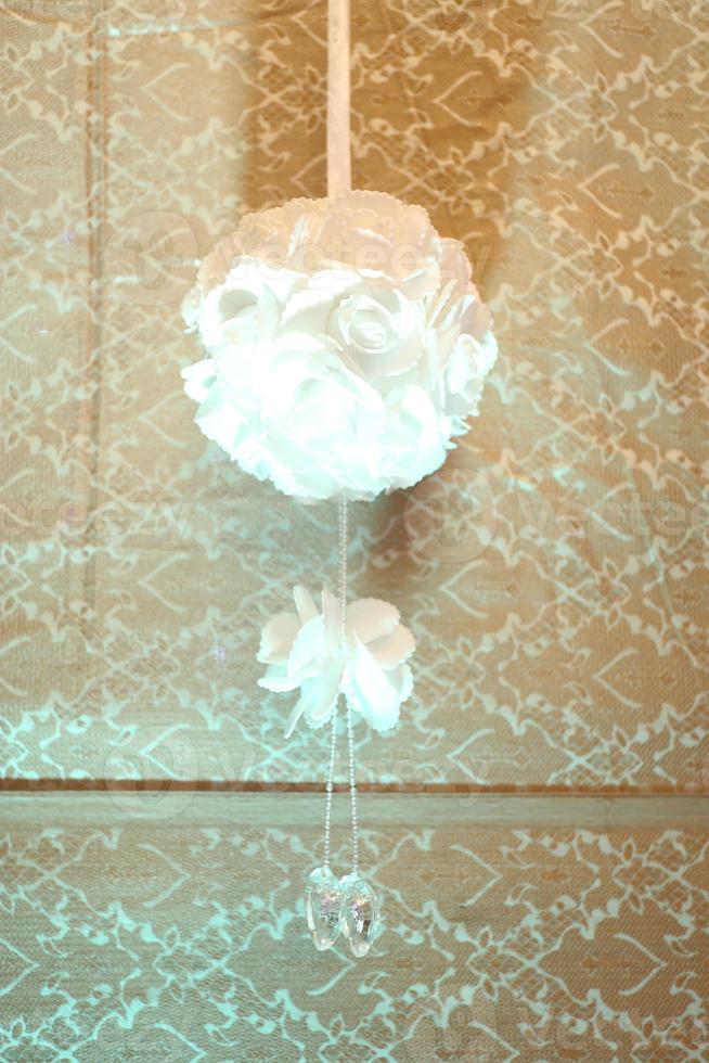 Hand made paper flower ball hanging on satge, Wedding decoration in Bangladesh. photo