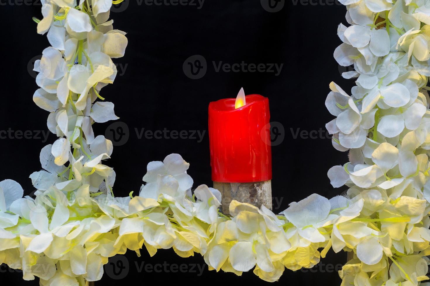 Wedding stage with artificial candles and flowers decoration. photo