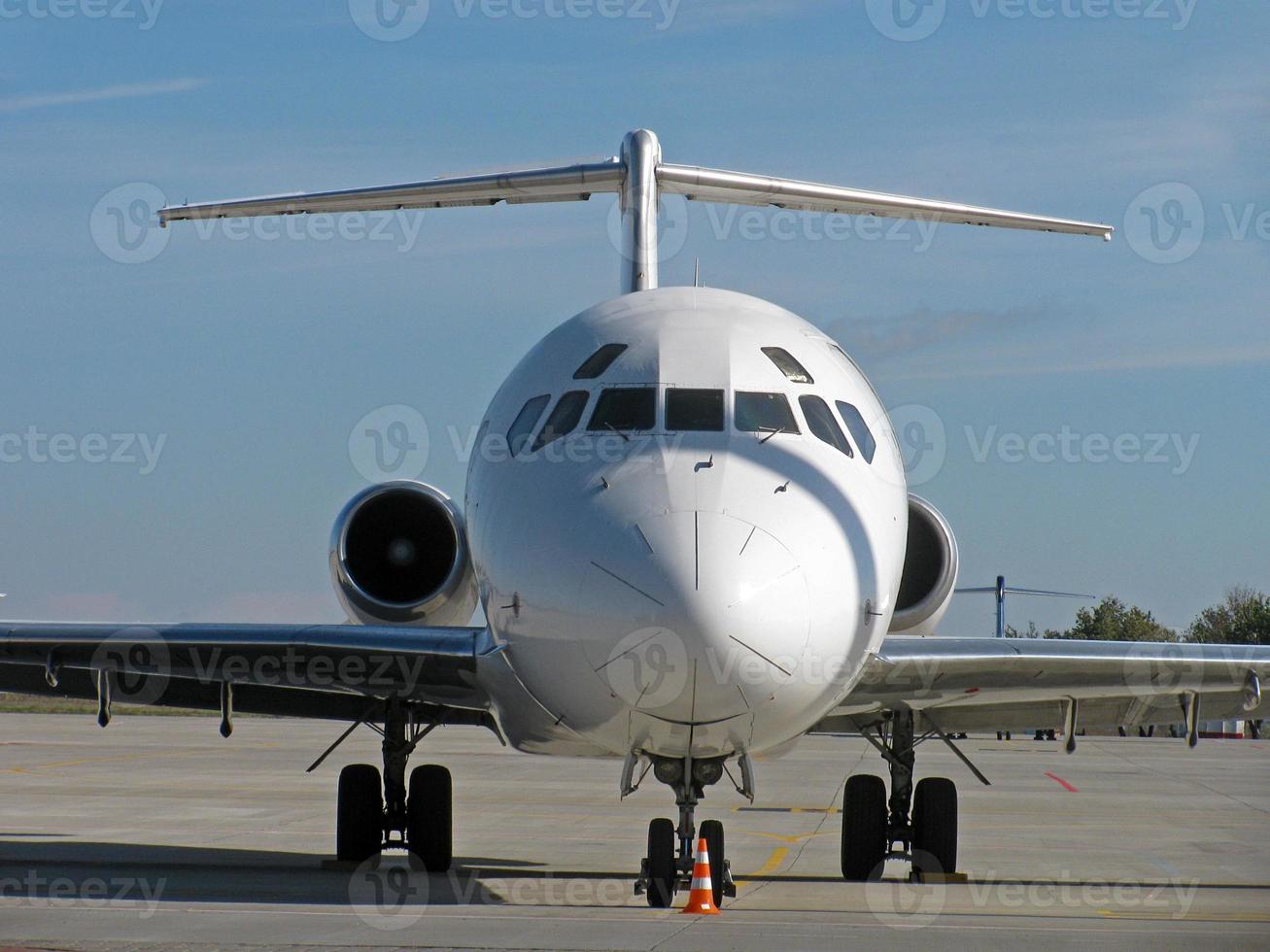 plane standing in airport photo