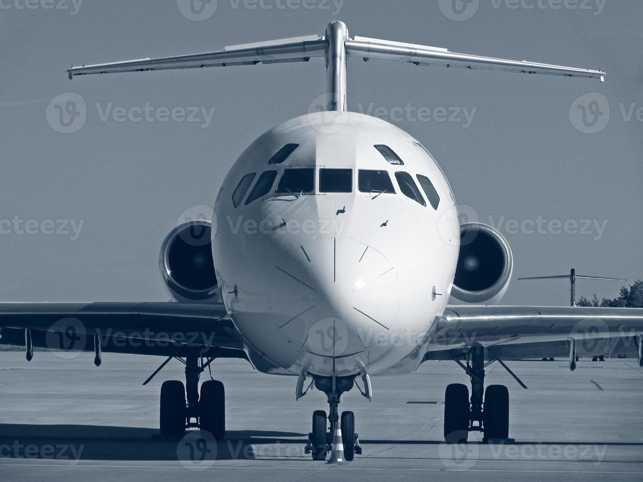 cockpit of plane standing in airport photo