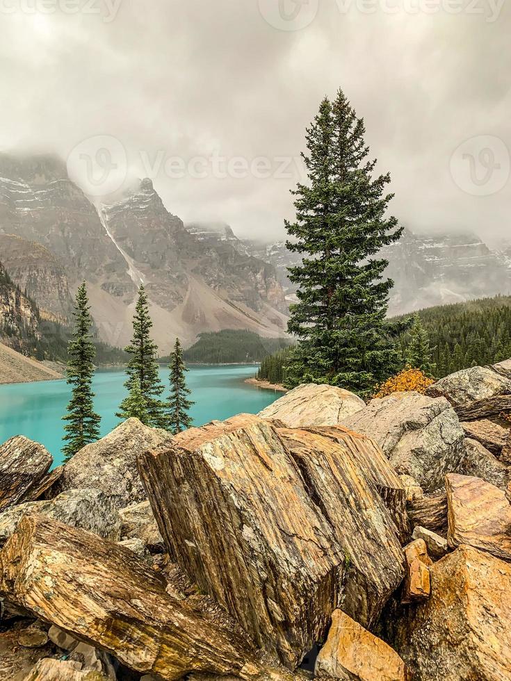 The Rock Pile at Moraine Lake in Banff National Park on a rainy day photo