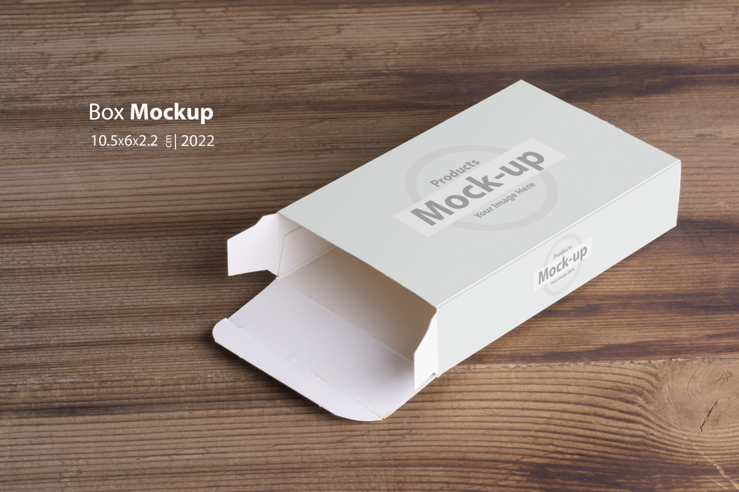 Opened empty pillbox on wooden table background psd