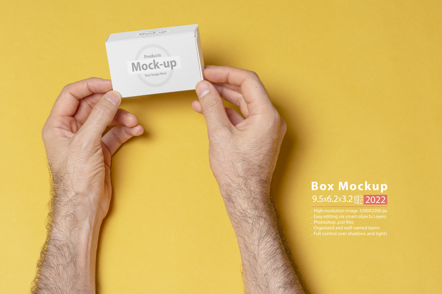 A man hands holding a pillbox in front of yellow background psd