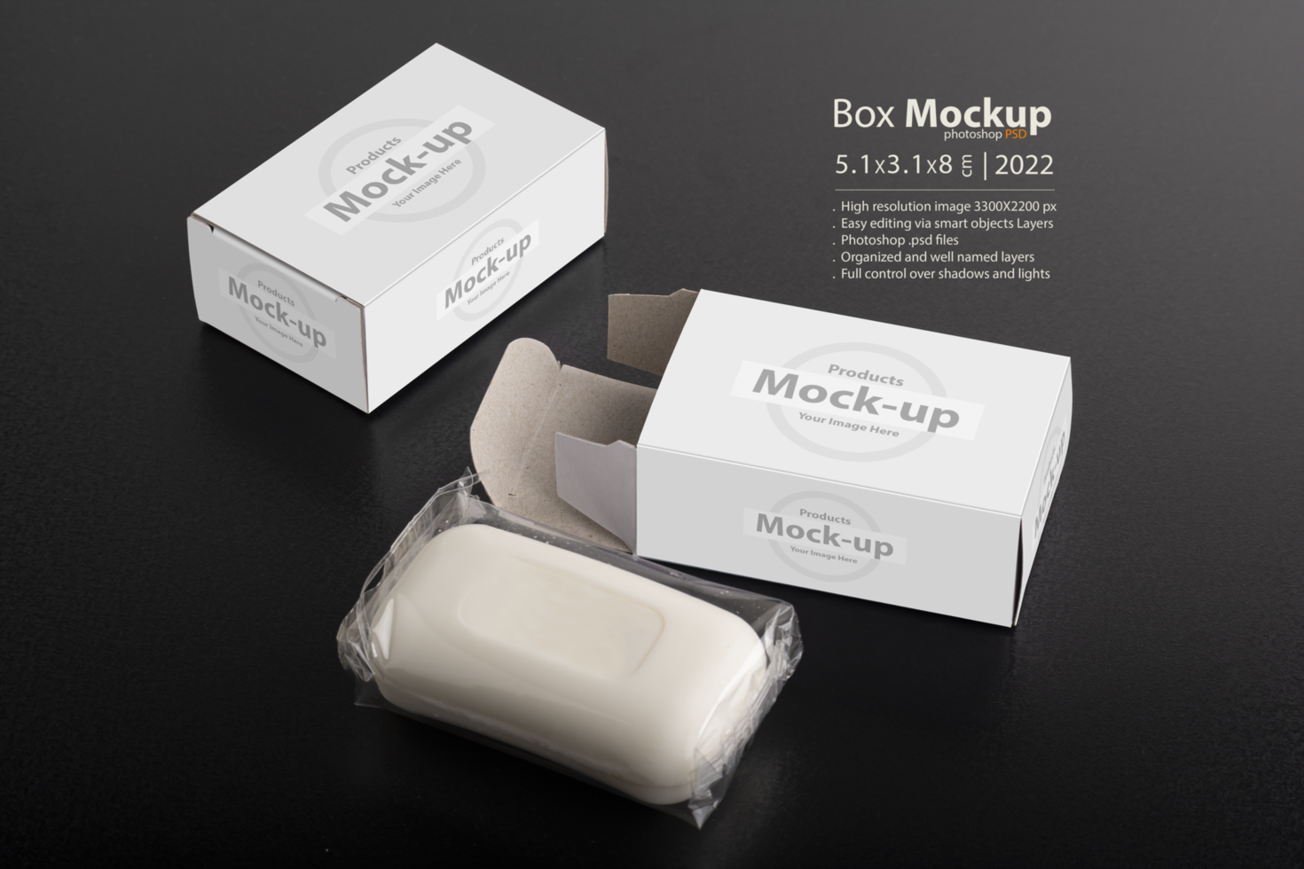 Opened soap package box on black surface psd