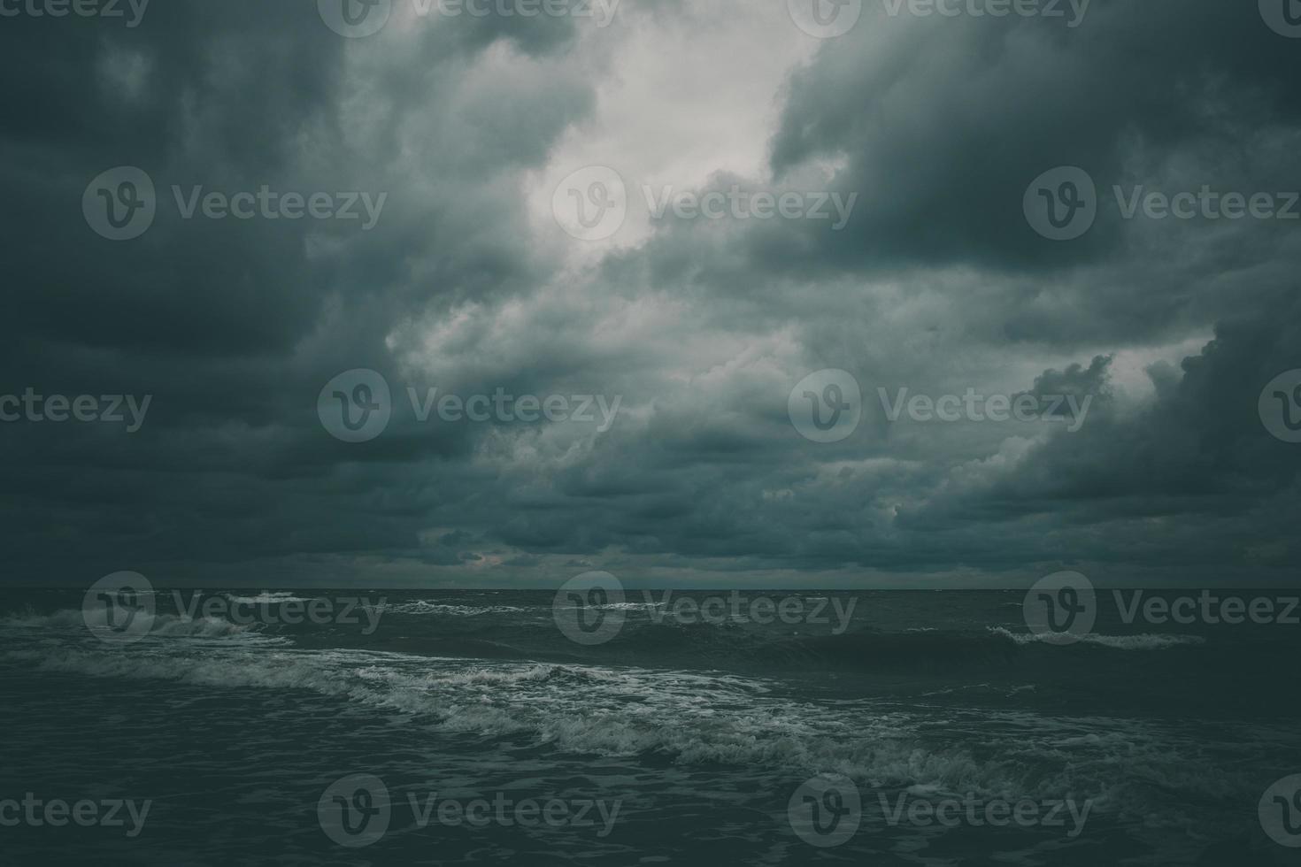 wide beach on the Baltic Sea in Poland on a summer cloudy gray cold day photo